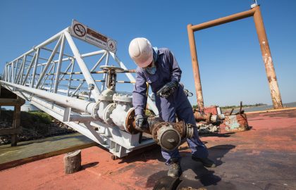 Male worker inspection and measurement thickness pipeline oil Male worker inspection and measurement thickness pipeline oil and gas at jetty